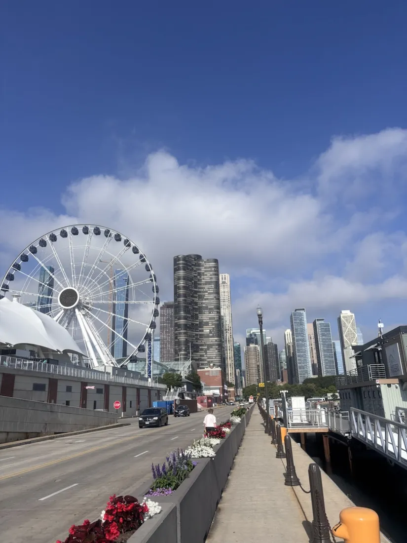 Navy Pier's Centennial Wheel rising over the downtown Chicago skyline
