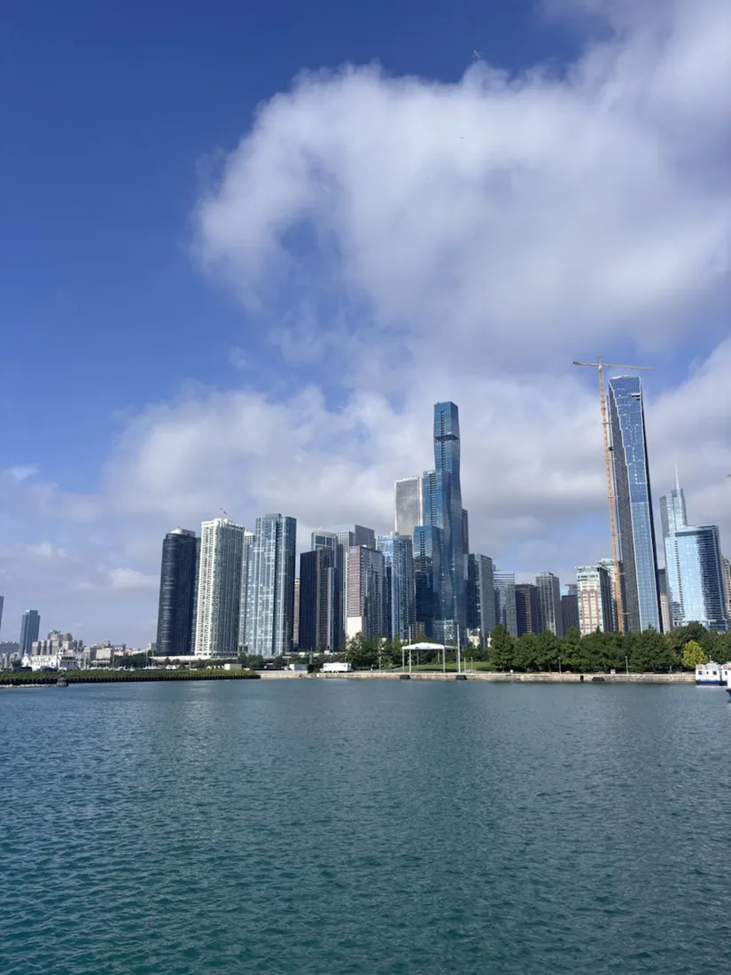 The downtown Chicago skyline across the harbour, the tiered St. Regis tower at its centre