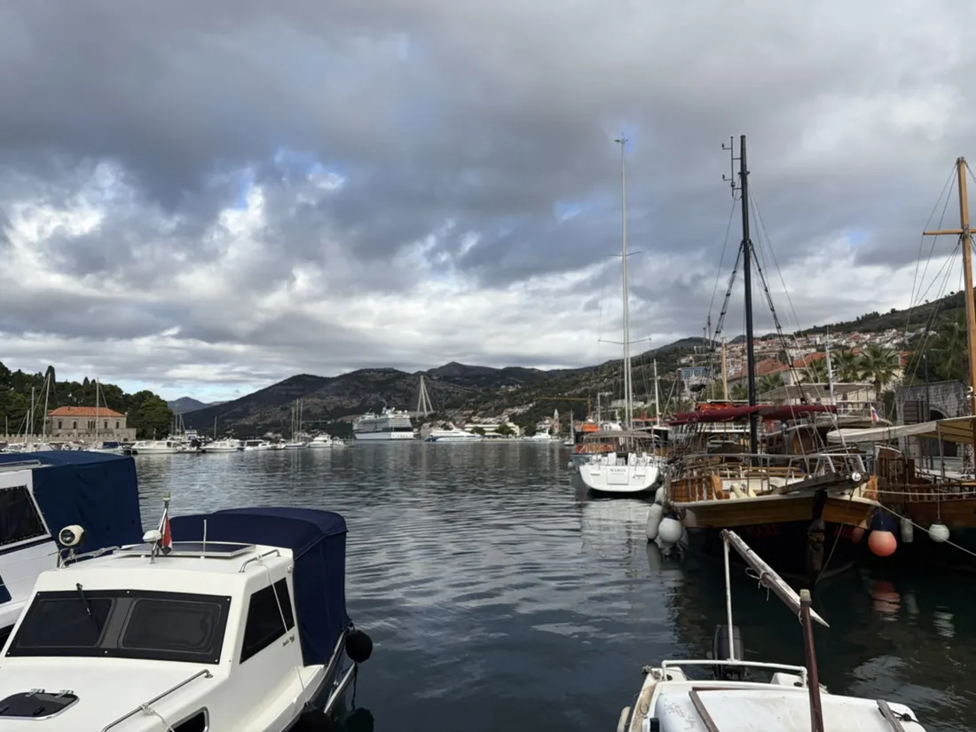 Moored boats and masts in Gruž harbour, looking out from Obala Stjepana Radića