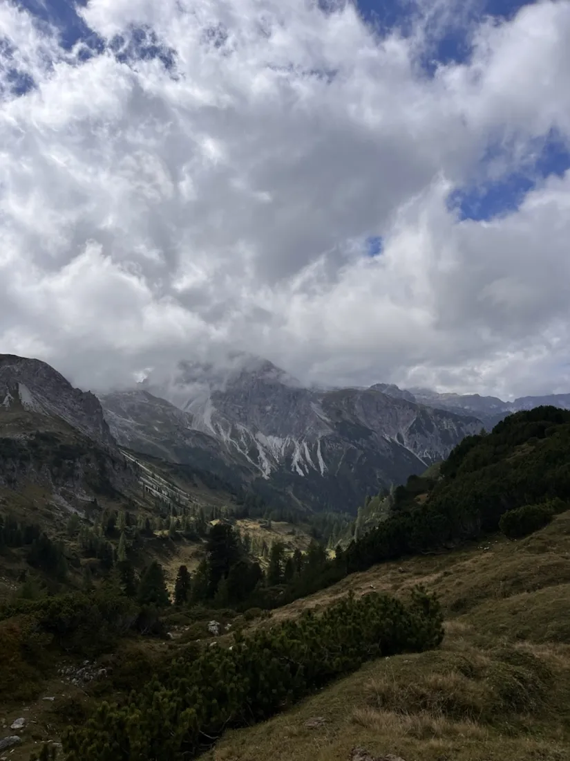Looking back across the valley from 2,047 m as the cloud sits on the tops