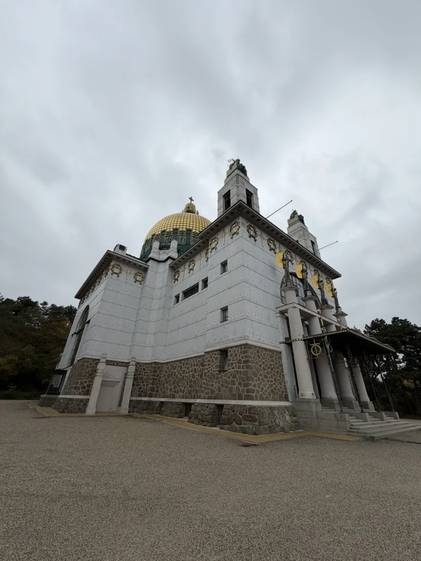 The pale façade and gold dome of Otto Wagner’s Church of St. Leopold at Steinhof